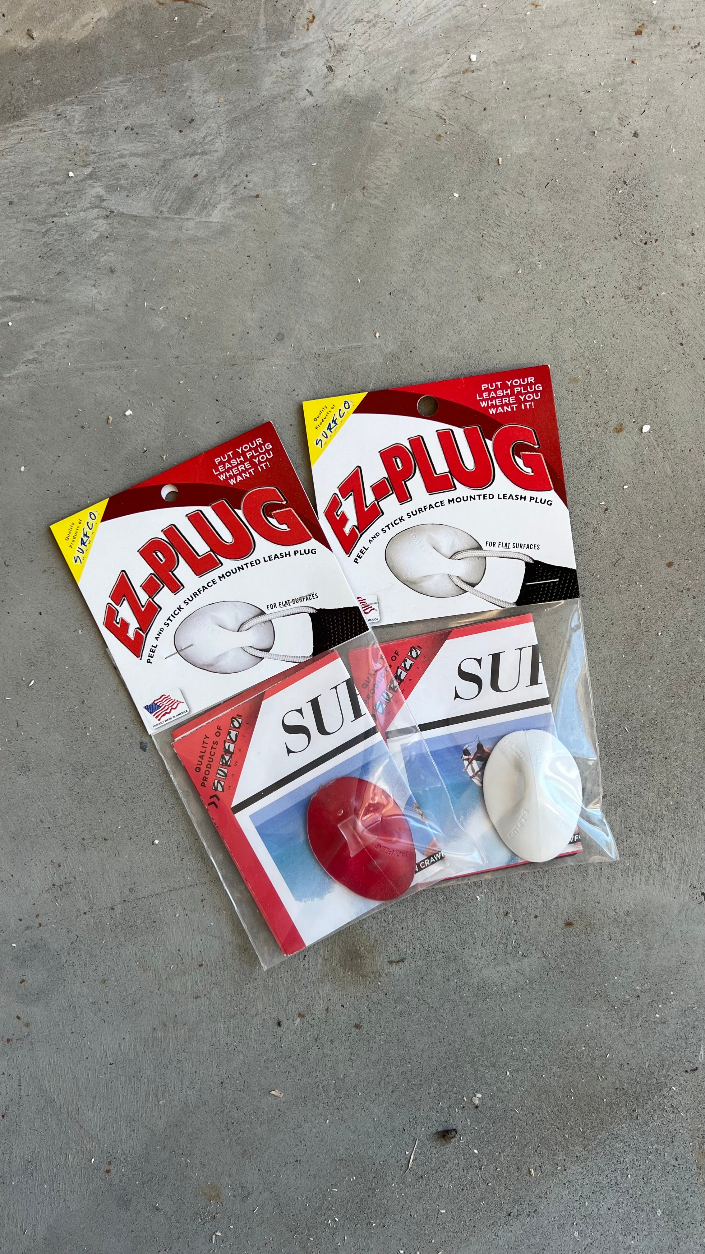 Stick on leash plugs